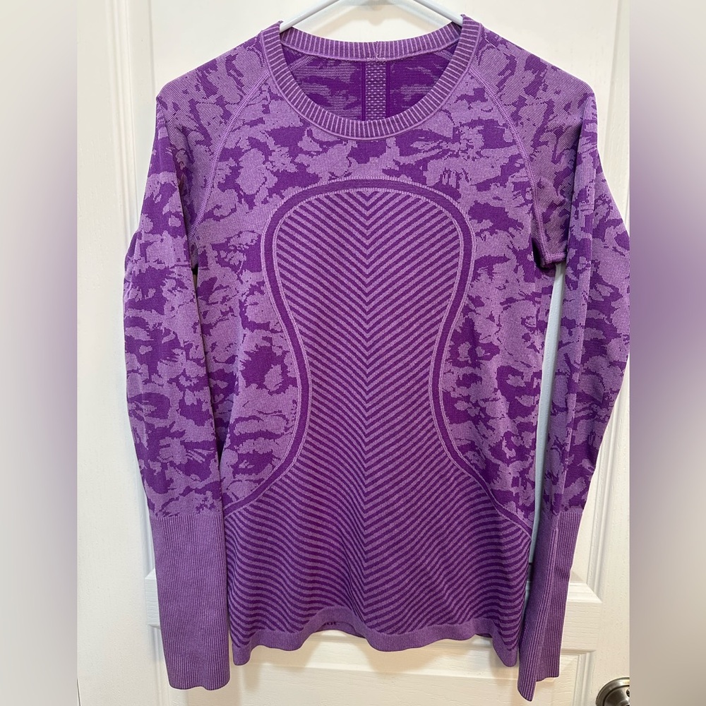 Lululemon Swiftly Tech Long Sleeve Crew 
Size 8
Color Heathered Tender Violet